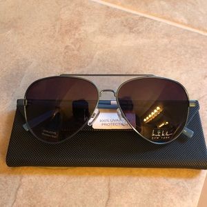Nicole Miller sun glasses